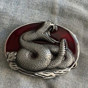 Silver Tone Rattle Snake Belt Buckle With Red Background